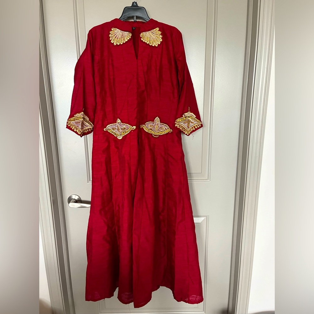 Maroon salwar with a slit in the middle. Comes with matching pencil pants